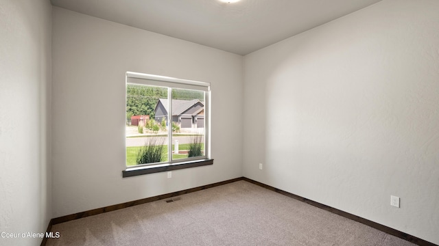 3306 Goodman Dr, Sandpoint, ID 83864 - carpeted empty room featuring baseboards