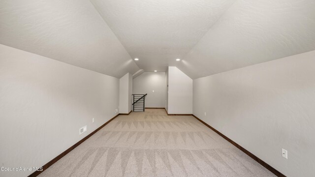 3306 Goodman Dr, Sandpoint, ID 83864 - bonus room featuring vaulted ceiling and light colored carpet