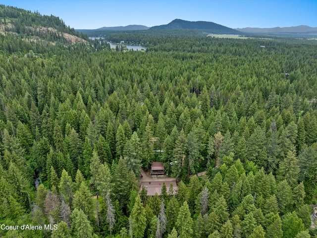 19565 N Goelzer Way, Rathdrum, ID 83858 - drone / aerial view of a heavily wooded area and a mountain backdrop