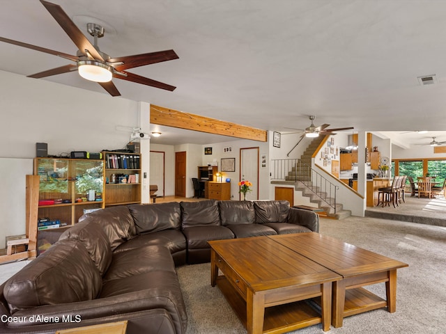 19565 N Goelzer Way, Rathdrum, ID 83858 - carpeted living area with a ceiling fan, stairs, and beam ceiling