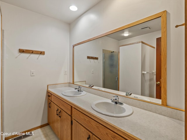 19565 N Goelzer Way, Rathdrum, ID 83858 - full bathroom featuring a shower stall and double vanity