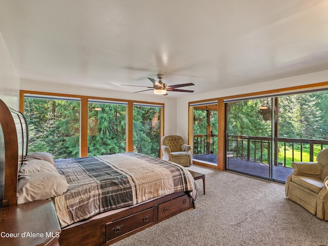 19565 N Goelzer Way, Rathdrum, ID 83858 - bedroom with access to exterior, carpet flooring, and a ceiling fan