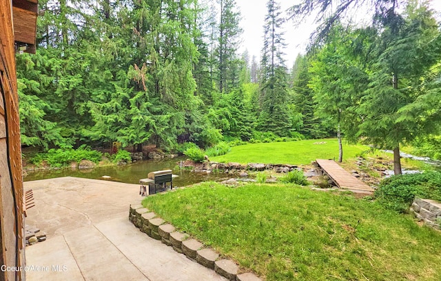 19565 N Goelzer Way, Rathdrum, ID 83858 - view of grassy yard with a patio