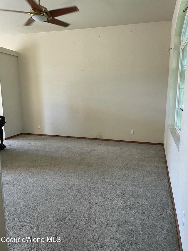 6953 N Caracara Ln, Coeur Dalene, ID 83815 - empty room featuring a ceiling fan and carpet floors