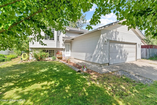 7560 W Sunrise St, Rathdrum, ID 83858 - view of front facade featuring concrete driveway and an attached garage