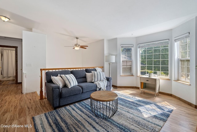 7560 W Sunrise St, Rathdrum, ID 83858 - living area with light wood-type flooring, a ceiling fan, and lofted ceiling