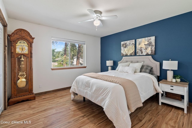 7560 W Sunrise St, Rathdrum, ID 83858 - bedroom featuring light wood finished floors and a ceiling fan