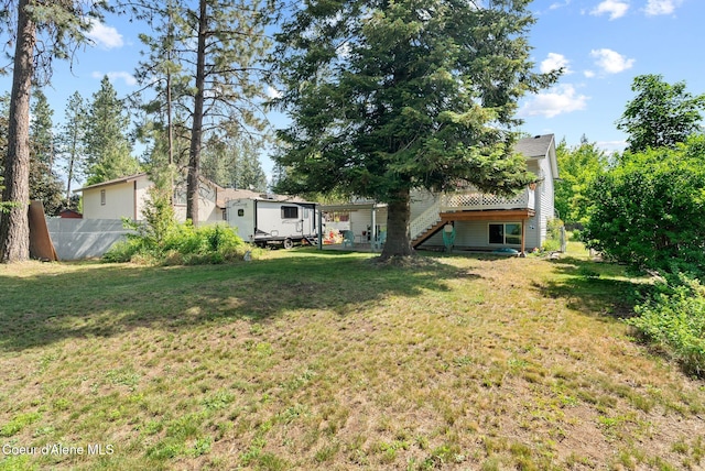 7560 W Sunrise St, Rathdrum, ID 83858 - view of yard featuring stairs and a wooden deck