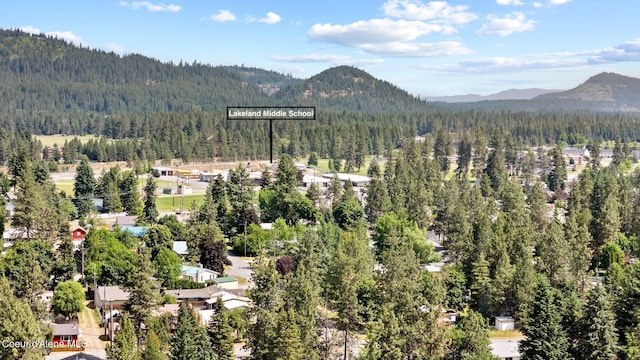 7560 W Sunrise St, Rathdrum, ID 83858 - mountain view with a heavily wooded area