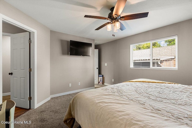 1318 N 10th St, Coeur Dalene, ID 83814 - bedroom with a ceiling fan and carpet floors