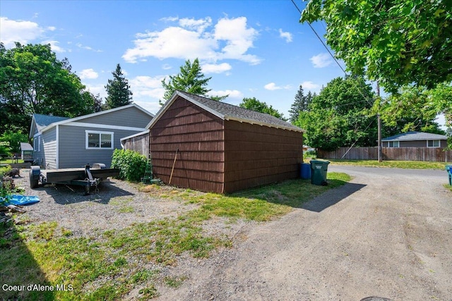 1318 N 10th St, Coeur Dalene, ID 83814 - view of property exterior with an outbuilding