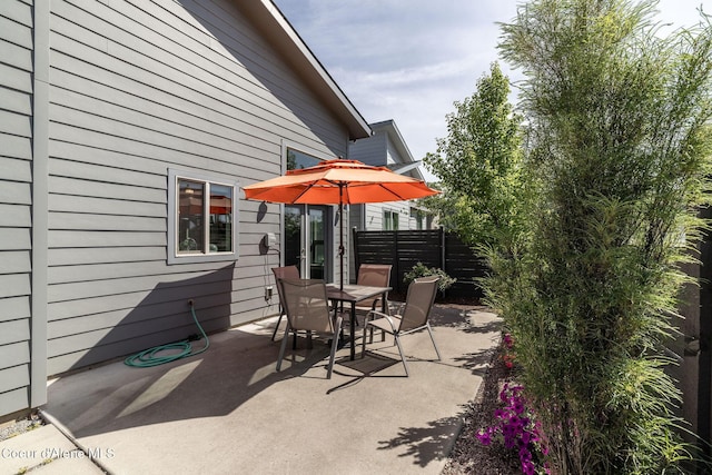 2999 N Casa Ct, Coeur Dalene, ID 83814 - view of patio / terrace with outdoor dining space