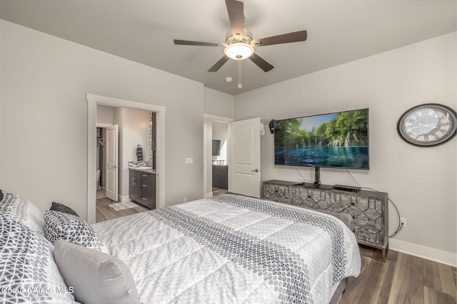 2999 N Casa Ct, Coeur Dalene, ID 83814 - bedroom with wood finished floors, ceiling fan, and connected bathroom