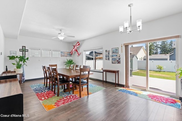6522 N Idlewood Dr, Coeur Dalene, ID 83815 - dining area featuring plenty of natural light, a ceiling fan, and wood finished floors