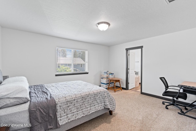 6522 N Idlewood Dr, Coeur Dalene, ID 83815 - bedroom featuring carpet, a textured ceiling, and ensuite bath