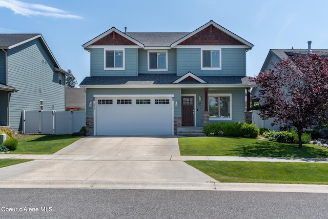 6522 N Idlewood Dr, Coeur Dalene, ID 83815 - craftsman inspired home featuring driveway, a shingled roof, a garage, and stone siding