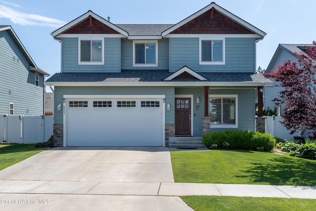 6522 N Idlewood Dr, Coeur Dalene, ID 83815 - craftsman inspired home with roof with shingles, concrete driveway, and a garage