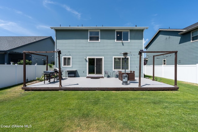 6522 N Idlewood Dr, Coeur Dalene, ID 83815 - rear view of house featuring a pergola, a fenced backyard, and a wooden deck