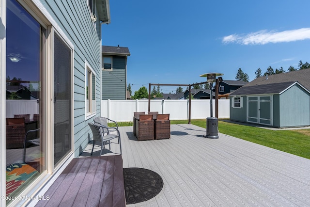 6522 N Idlewood Dr, Coeur Dalene, ID 83815 - deck featuring a shed and a fenced backyard
