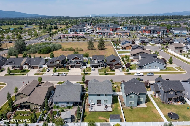 6522 N Idlewood Dr, Coeur Dalene, ID 83815 - aerial view of residential area featuring a mountainous background
