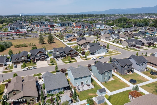 6522 N Idlewood Dr, Coeur Dalene, ID 83815 - aerial view of residential area featuring a mountainous background