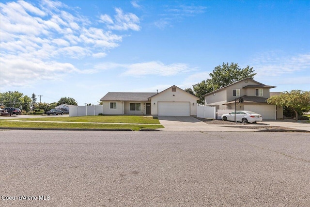 1601 N Summer Rose St, Post Falls, ID 83854 - view of front facade with driveway and a garage