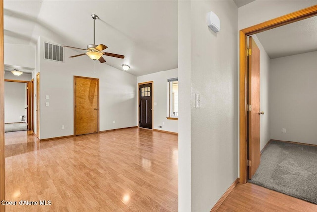 1601 N Summer Rose St, Post Falls, ID 83854 - unfurnished room with a ceiling fan, wood finished floors, and lofted ceiling