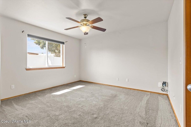 1601 N Summer Rose St, Post Falls, ID 83854 - carpeted spare room with a ceiling fan and baseboards