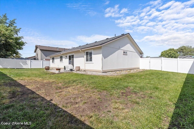 1601 N Summer Rose St, Post Falls, ID 83854 - back of property with a fenced backyard