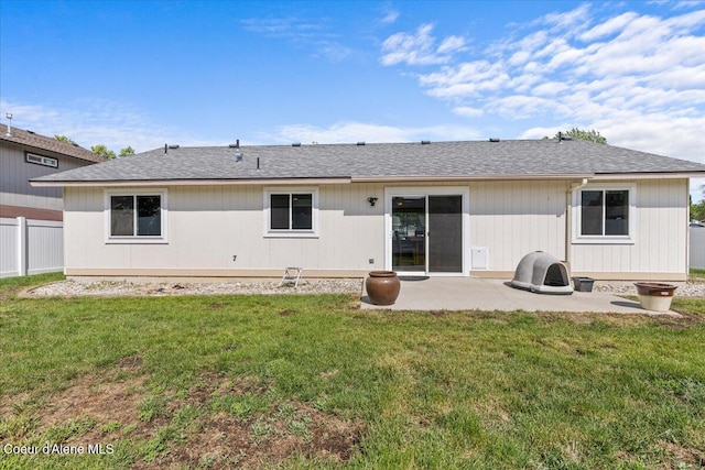 1601 N Summer Rose St, Post Falls, ID 83854 - rear view of house with a patio area and roof with shingles