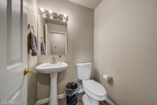 931 N Goldenrod Ct, Post Falls, ID 83854 - bathroom with toilet and baseboards