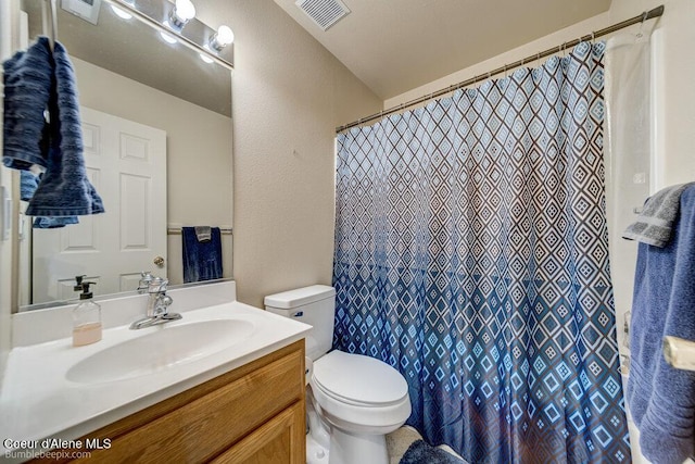 931 N Goldenrod Ct, Post Falls, ID 83854 - bathroom with vanity and curtained shower