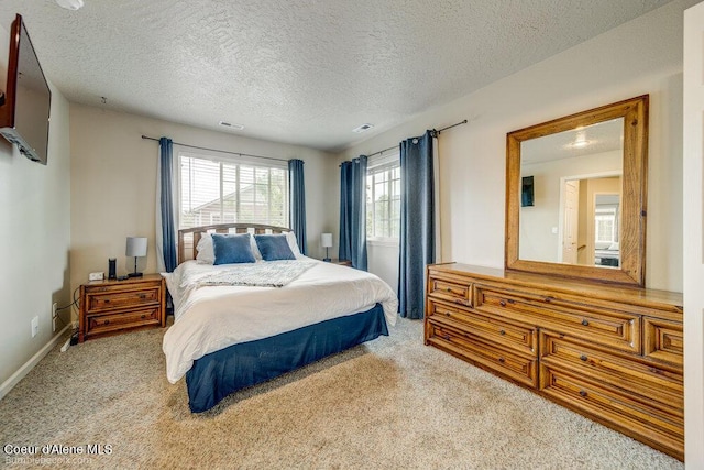 931 N Goldenrod Ct, Post Falls, ID 83854 - bedroom featuring carpet and a textured ceiling