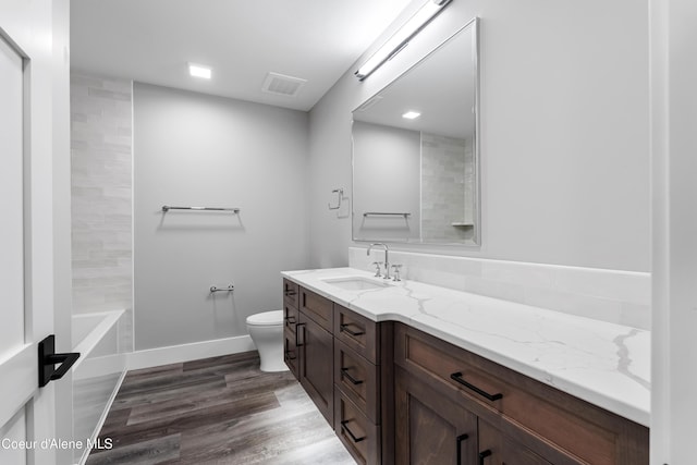 802 Sandpoint Ave # 8302, Sandpoint, ID 83864 - bathroom featuring vanity, wood finished floors, and shower / washtub combination