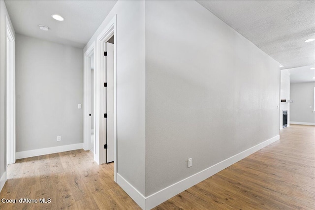 3510 N Cyprus Fox Loop, Post Falls, ID 83854 - corridor with wood finished floors and recessed lighting