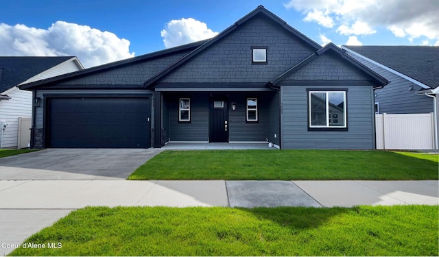 3510 N Cyprus Fox Loop, Post Falls, ID 83854 - view of front of house featuring a garage and driveway