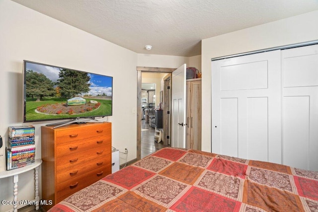 7934 W Kayak Ct, Rathdrum, ID 83858 - bedroom with a textured ceiling and a closet
