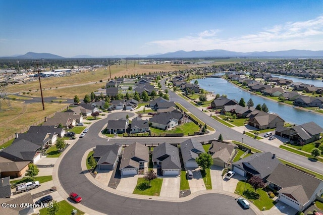 7934 W Kayak Ct, Rathdrum, ID 83858 - aerial view of property's location featuring nearby suburban area and a water and mountain view