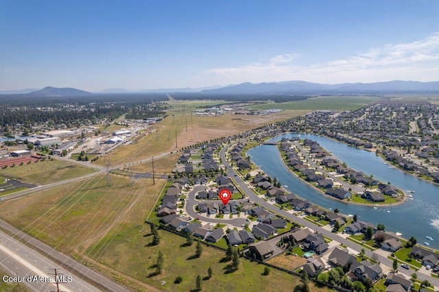 7934 W Kayak Ct, Rathdrum, ID 83858 - aerial view of property's location featuring a water and mountain view and nearby suburban area