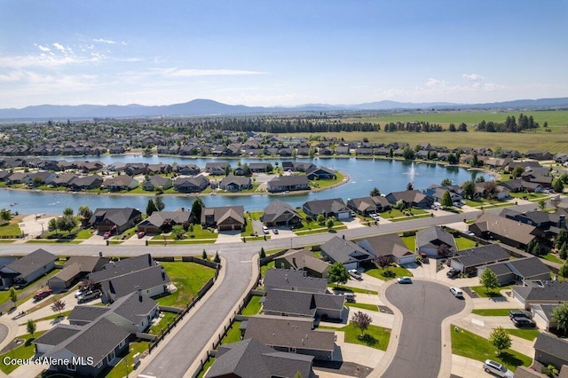 7934 W Kayak Ct, Rathdrum, ID 83858 - aerial overview of property's location featuring nearby suburban area and a water and mountain view