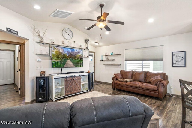 7934 W Kayak Ct, Rathdrum, ID 83858 - living area with vaulted ceiling, ceiling fan, wood finished floors, and recessed lighting