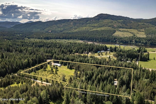 12 Otts Basin Rd, Sagle, ID 83860 - aerial view of property's location with a mountainous background and property boundaries highlighted