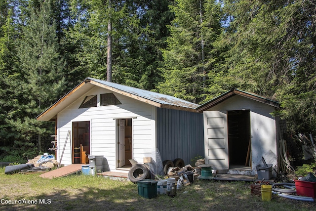12 Otts Basin Rd, Sagle, ID 83860 - view of shed featuring a view of trees