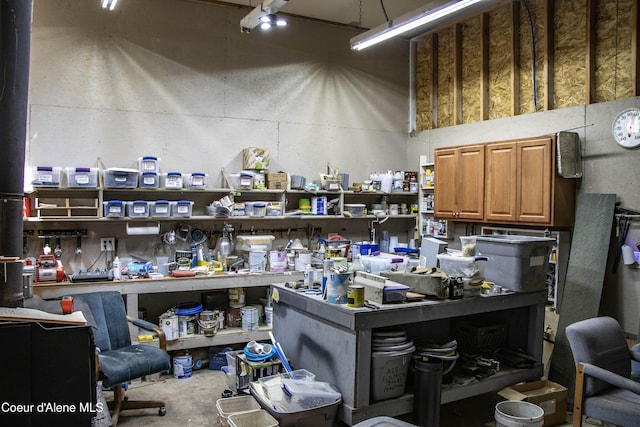 12 Otts Basin Rd, Sagle, ID 83860 - misc room featuring a workshop area, concrete flooring, and a high ceiling