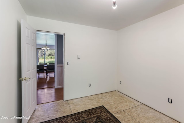 12 Otts Basin Rd, Sagle, ID 83860 - unfurnished room with a chandelier