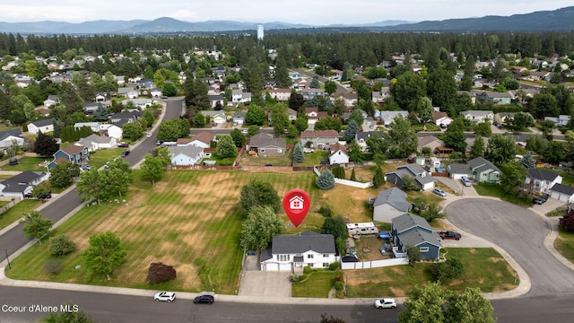 2442 N Rawhide Ridge Rd, Post Falls, ID 83854 - aerial view of property's location featuring mountains and nearby suburban area