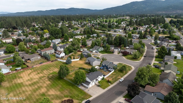 2442 N Rawhide Ridge Rd, Post Falls, ID 83854 - view of property location with a mountain backdrop and nearby suburban area