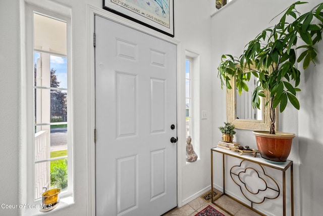 2442 N Rawhide Ridge Rd, Post Falls, ID 83854 - entryway featuring baseboards and light tile patterned floors
