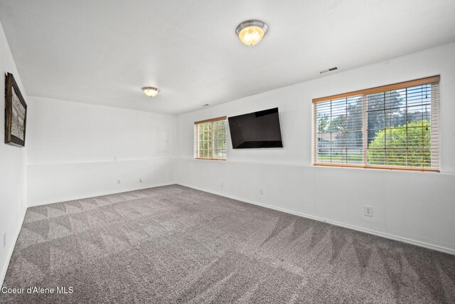 2442 N Rawhide Ridge Rd, Post Falls, ID 83854 - carpeted spare room with baseboards
