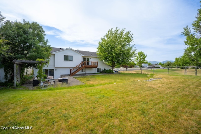 2442 N Rawhide Ridge Rd, Post Falls, ID 83854 - view of yard with stairway, a patio area, and a deck